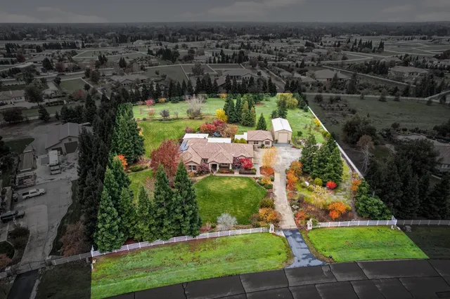 a view of a golf course with a lake