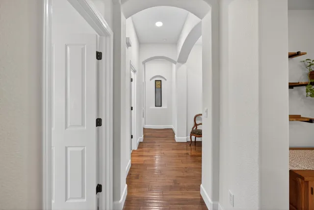 a view of a livingroom with furniture and a window