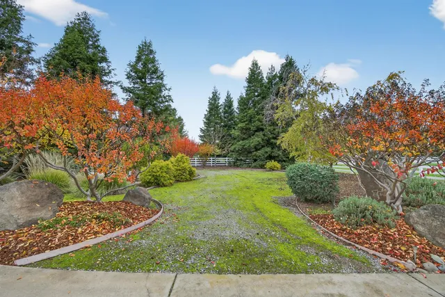 a view of a living room and dining room