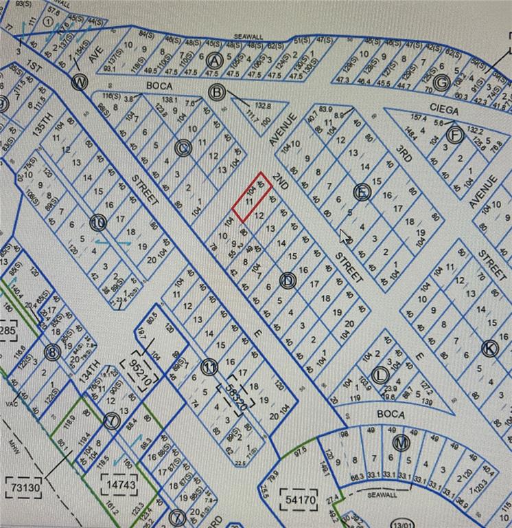 13354 2nd Street East Madeira Beach, FL 33708 - Photo 4 of 6 a picture of a book and a bed