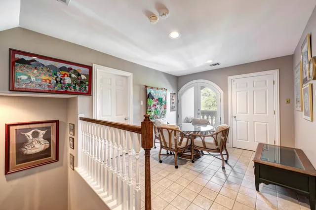 a view of a livingroom with furniture and a window