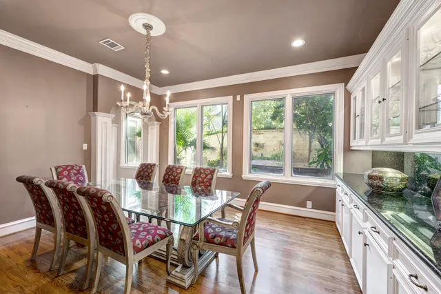 a view of a dining room with furniture window and outside view