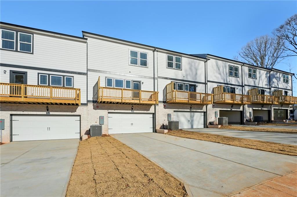 6440 Pinin Place Cumming, GA 30041 - Photo 50 of 52 a house view with a outdoor space