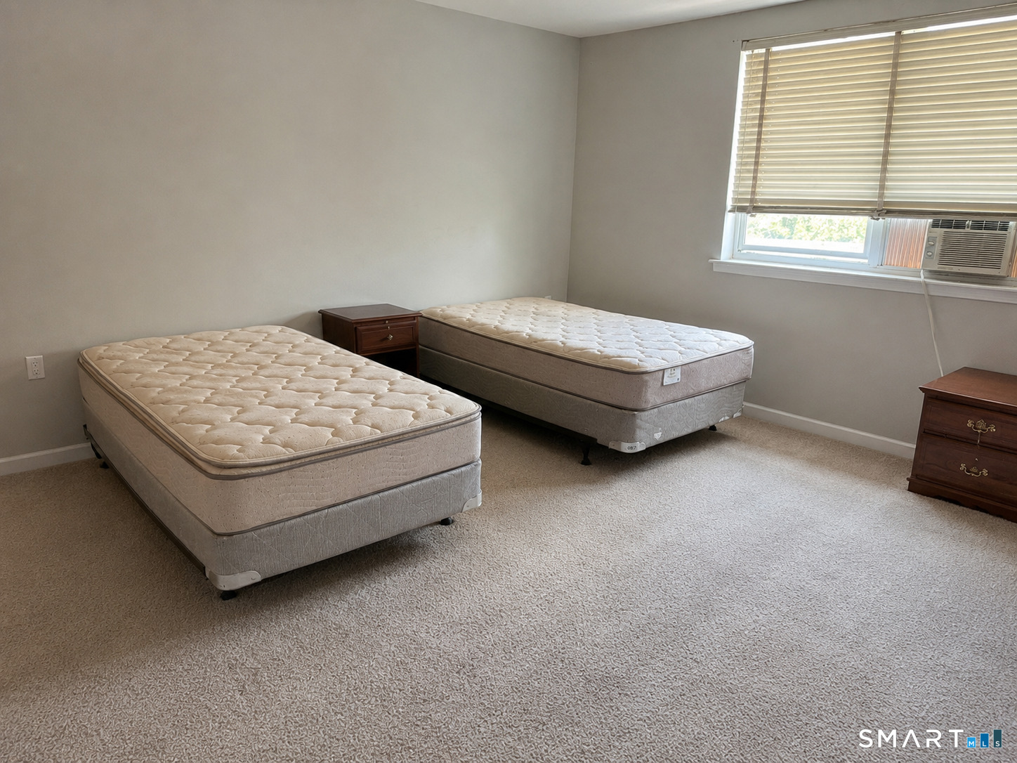 53 Wolcott Hill Road, Unit C12 Wethersfield, CT 06109 - Photo 15 of 25 a bedroom with bed and a window