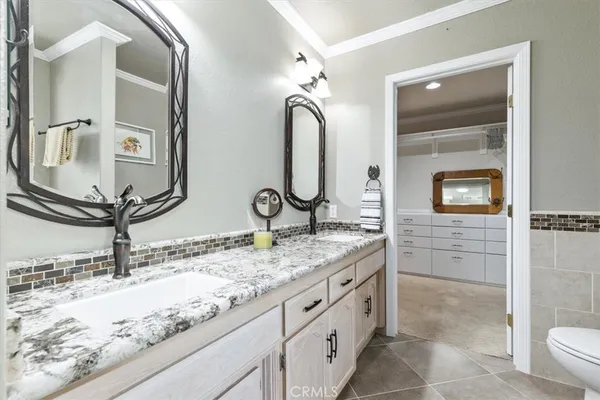 a utility room with cabinets