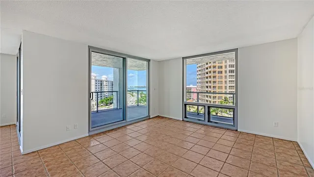 a view of an empty room with a window