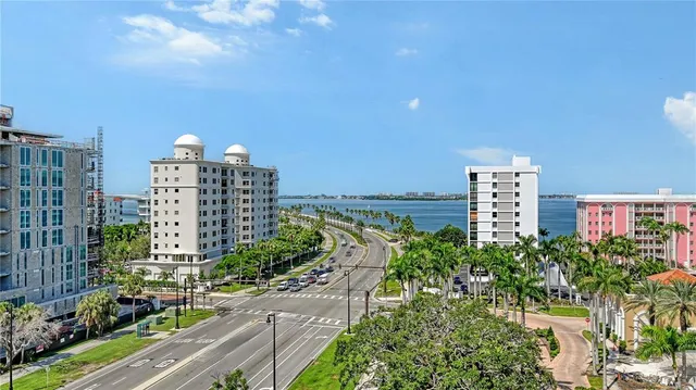 a view of a city with tall buildings