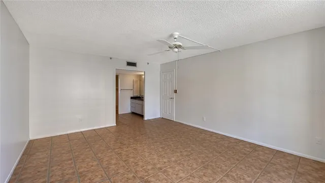 a view of a big room with closet and cabinet