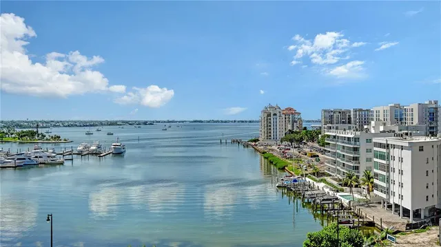 a view of a lake with a city