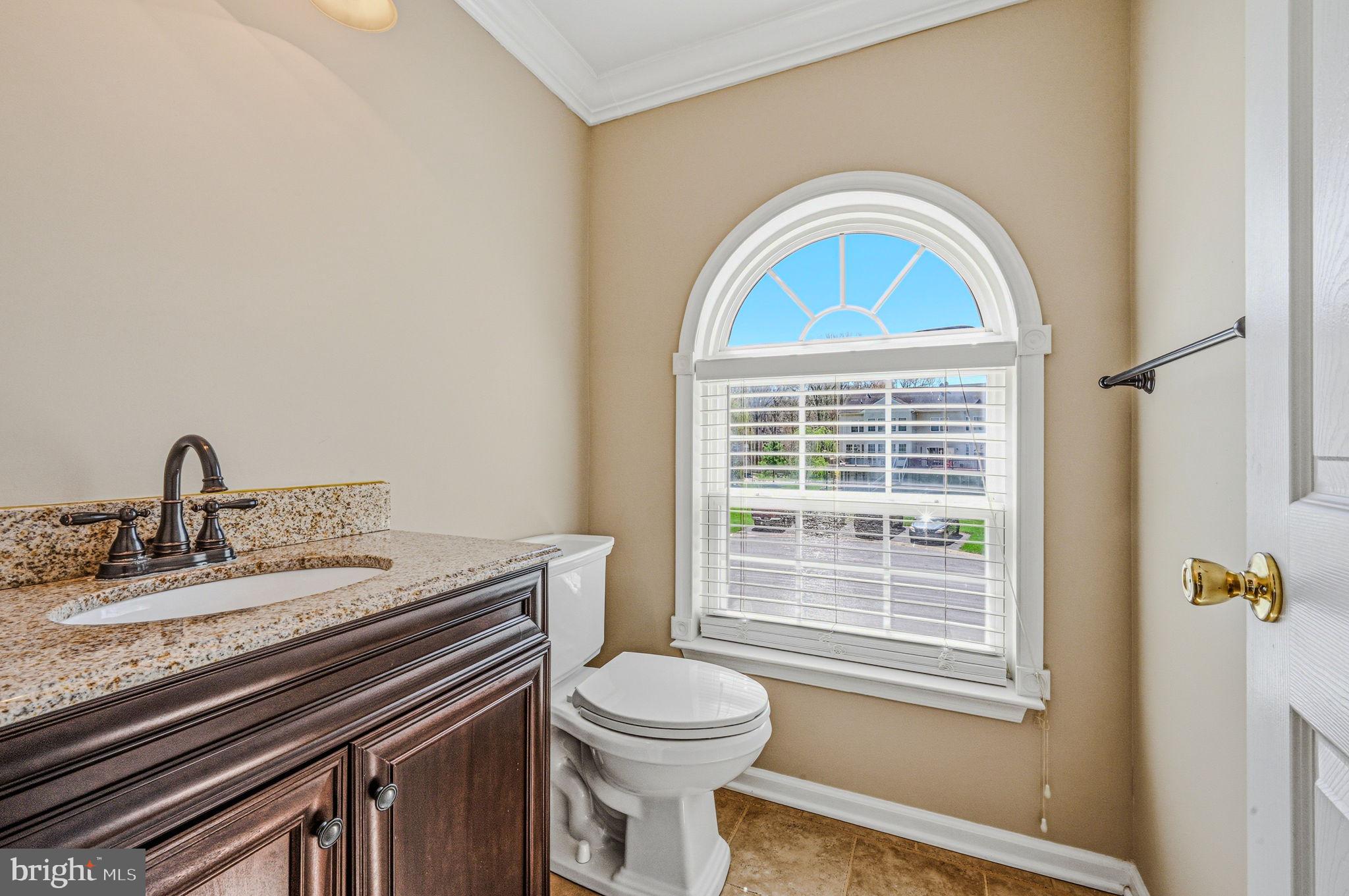 13 Laurel Way Bear, DE 19701 - Photo 25 of 44 a view of a bathroom with a sink and a window