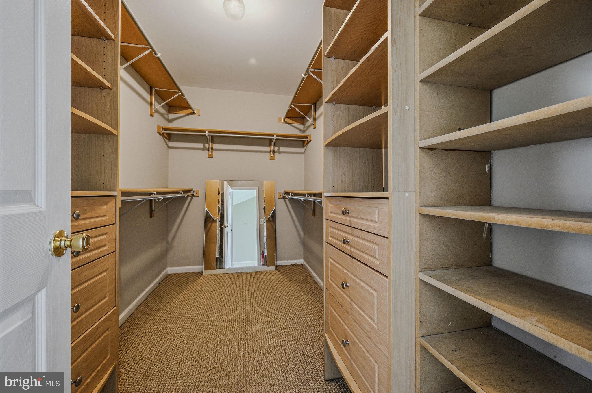 13 Laurel Way Bear, DE 19701 - Photo 30 of 44 a view of walk in closet with empty racks