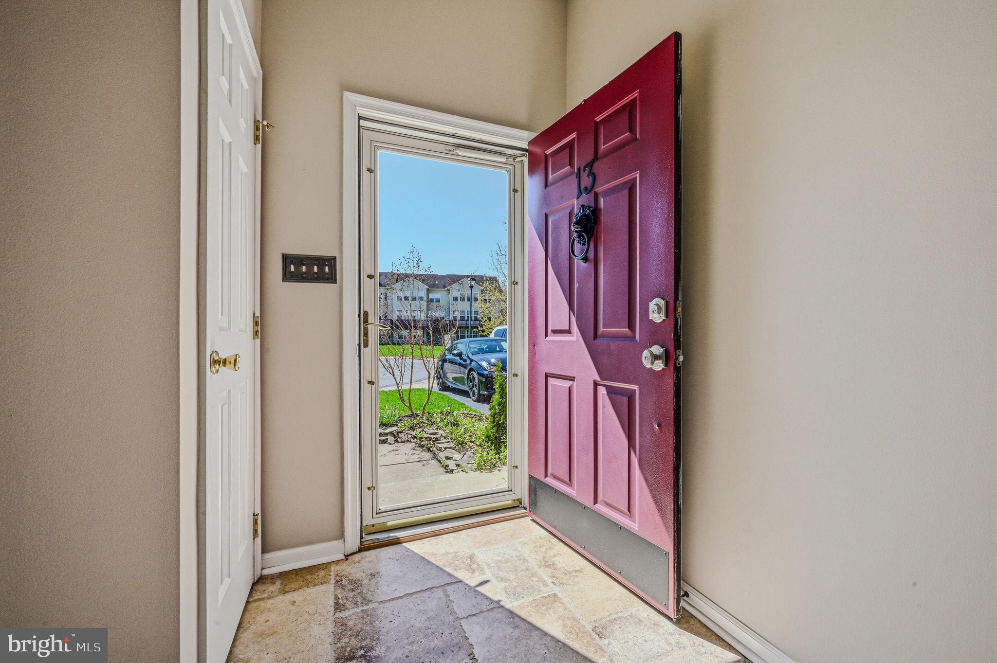 13 Laurel Way Bear, DE 19701 - Photo 3 of 44 a view of a red door in the house