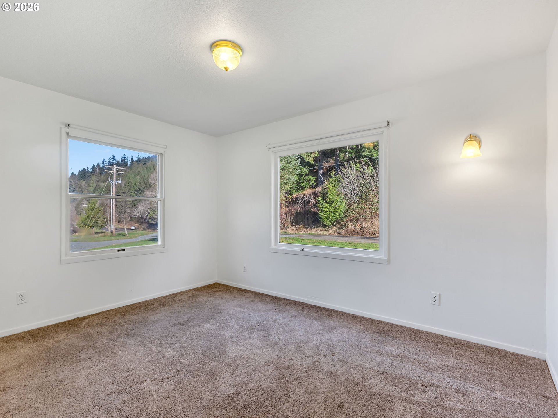 32300 Miami Foley Road Nehalem, OR 97131 - Photo 11 of 45 a view of an empty room with a window