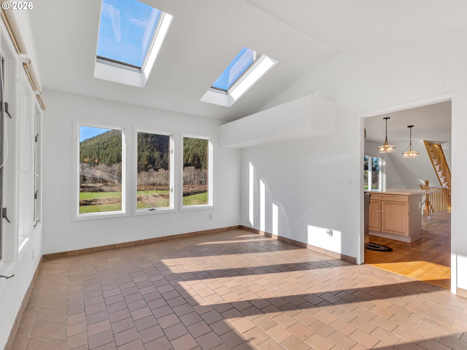 32300 Miami Foley Road Nehalem, OR 97131 - Photo 23 of 45 a spacious bedroom with a large bed and a window