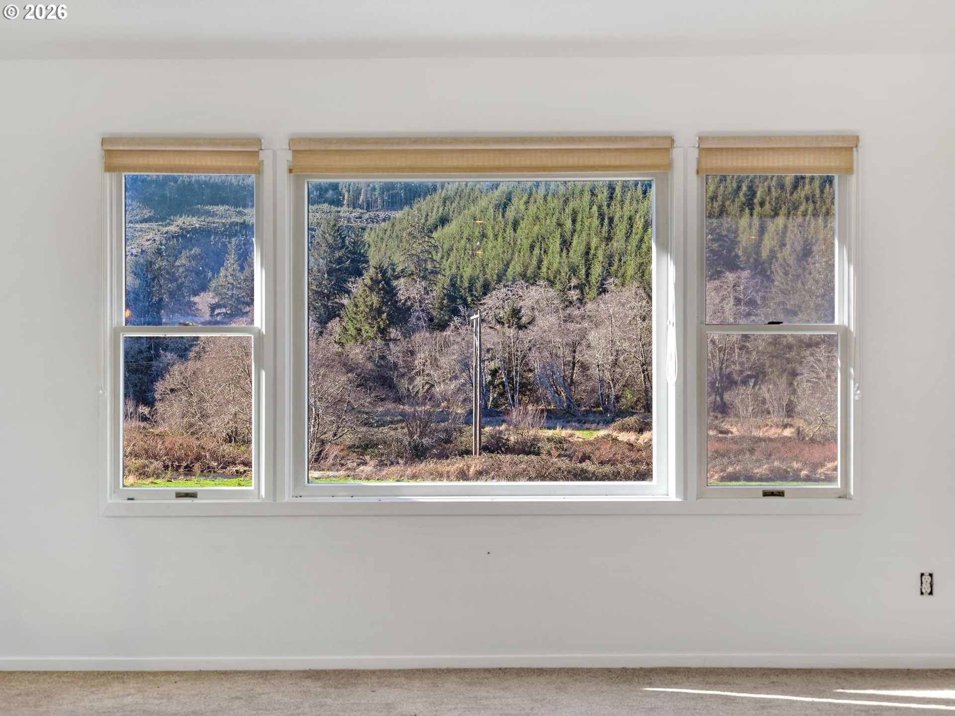 32300 Miami Foley Road Nehalem, OR 97131 - Photo 26 of 45 a view of a living room and a window