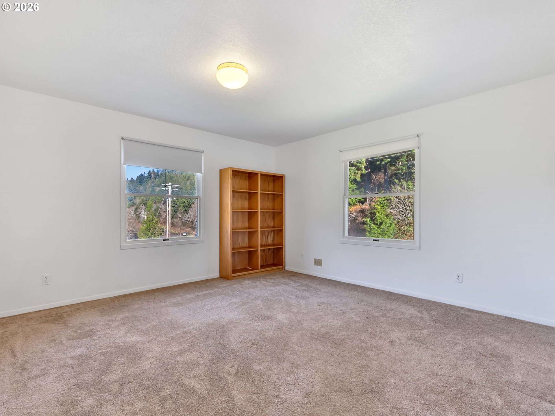 32300 Miami Foley Road Nehalem, OR 97131 - Photo 30 of 45 an empty room with windows