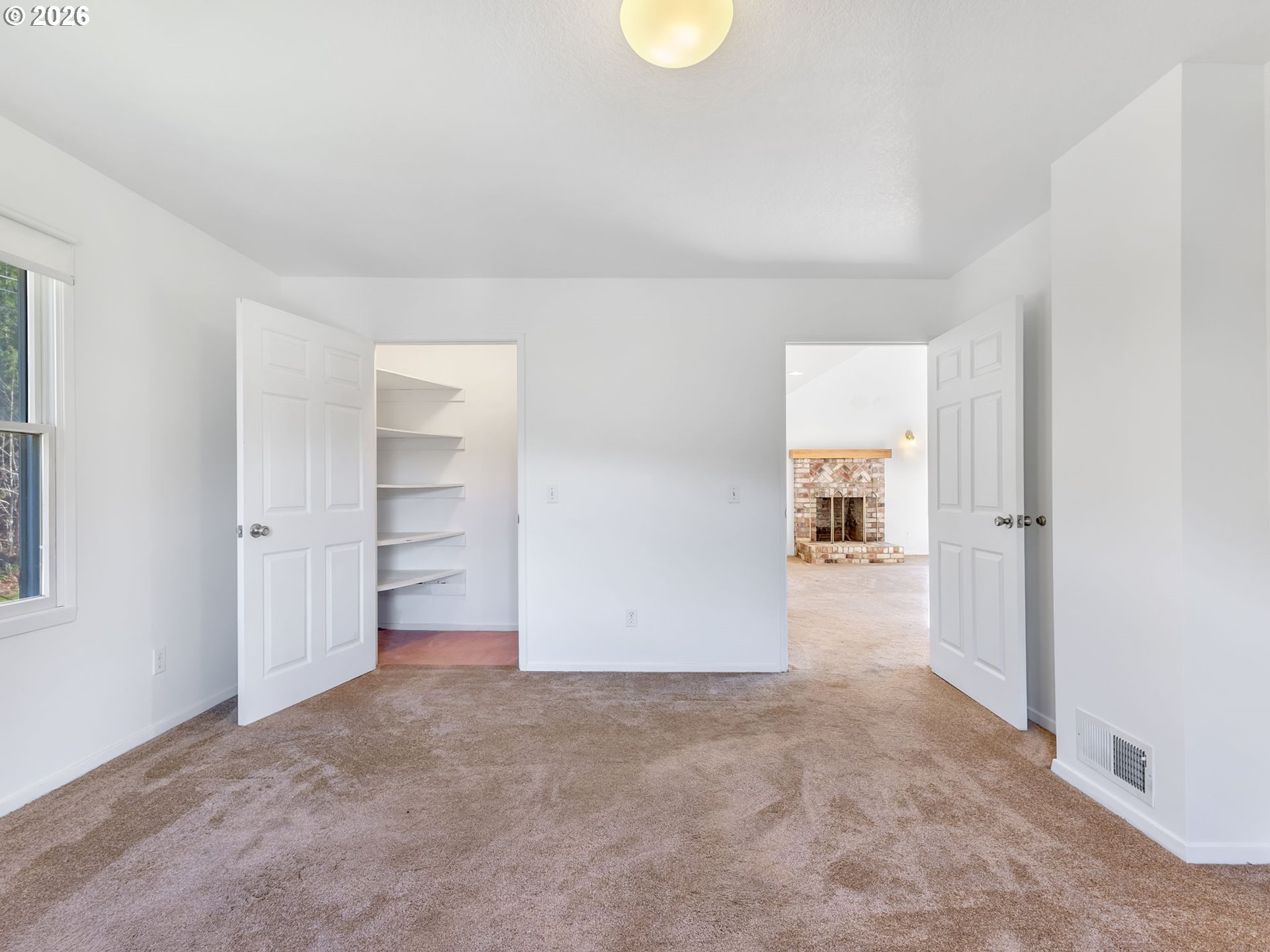32300 Miami Foley Road Nehalem, OR 97131 - Photo 31 of 45 an empty room with closet and windows