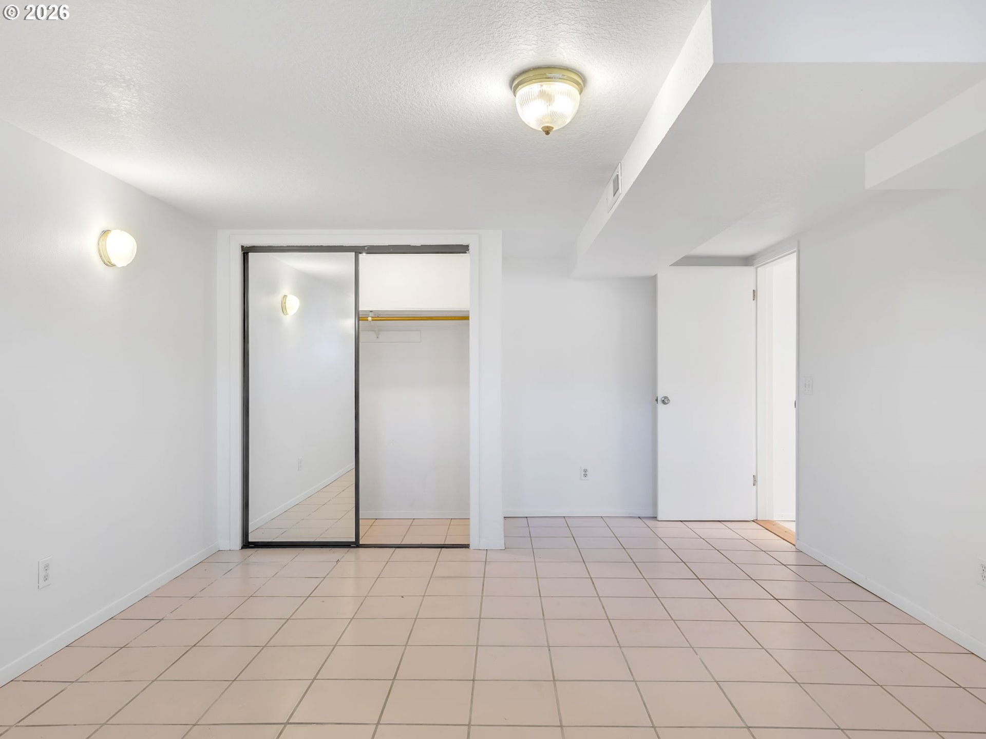 32300 Miami Foley Road Nehalem, OR 97131 - Photo 36 of 45 an empty room with windows and closet