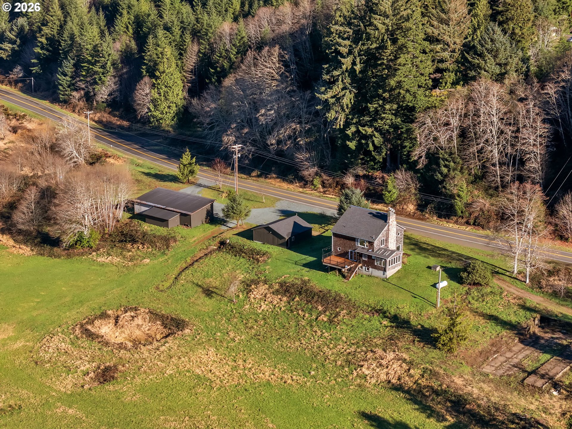 32300 Miami Foley Road Nehalem, OR 97131 - Photo 37 of 45 an aerial view of a house with a yard