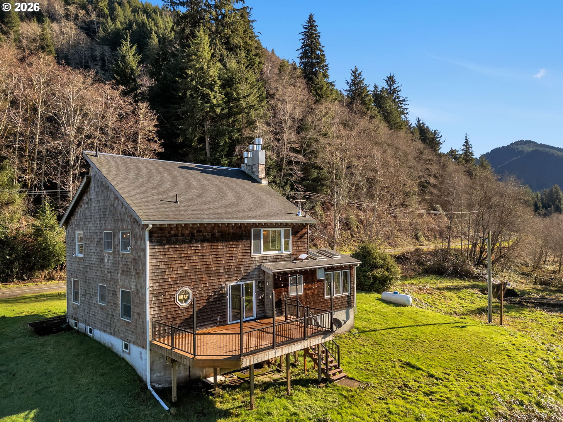 32300 Miami Foley Road Nehalem, OR 97131 - Photo 45 of 45 aerial view of a house with swimming pool next to a yard