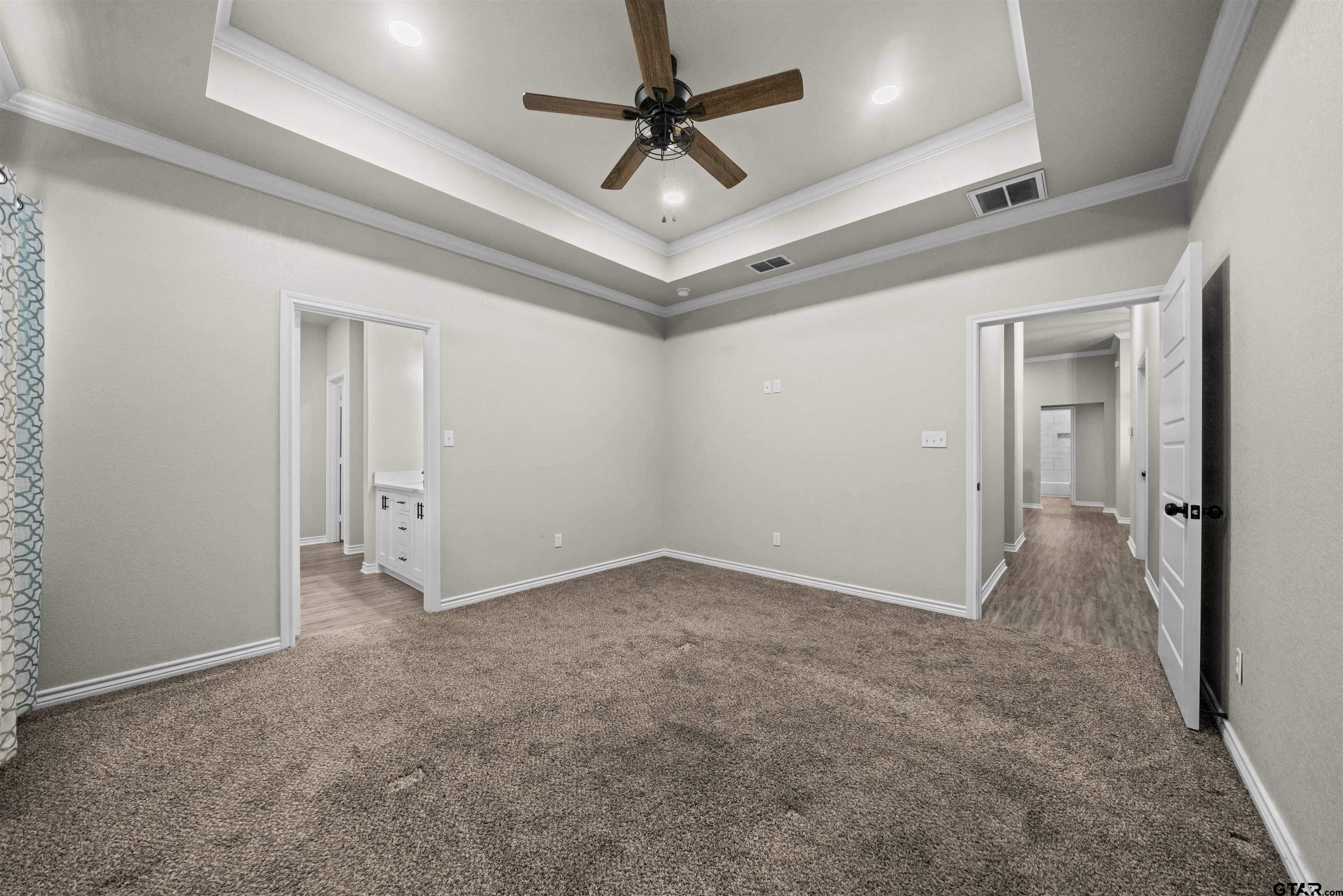 17023 County Road 2282 Troup, TX 75789 - Photo 15 of 30 en empty room with fan and a ceiling fan
