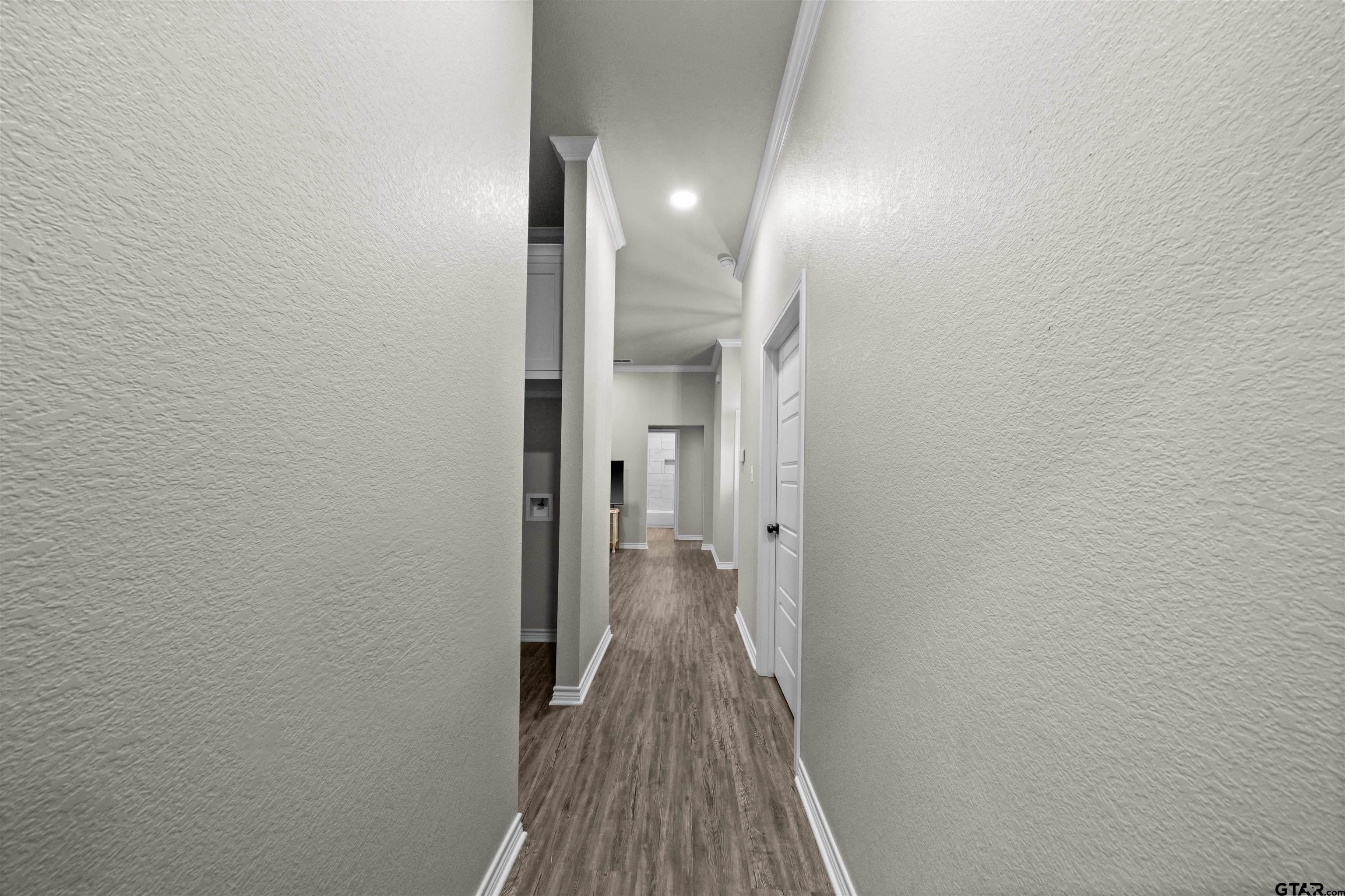 17023 County Road 2282 Troup, TX 75789 - Photo 21 of 30 a view of a room with wooden floor