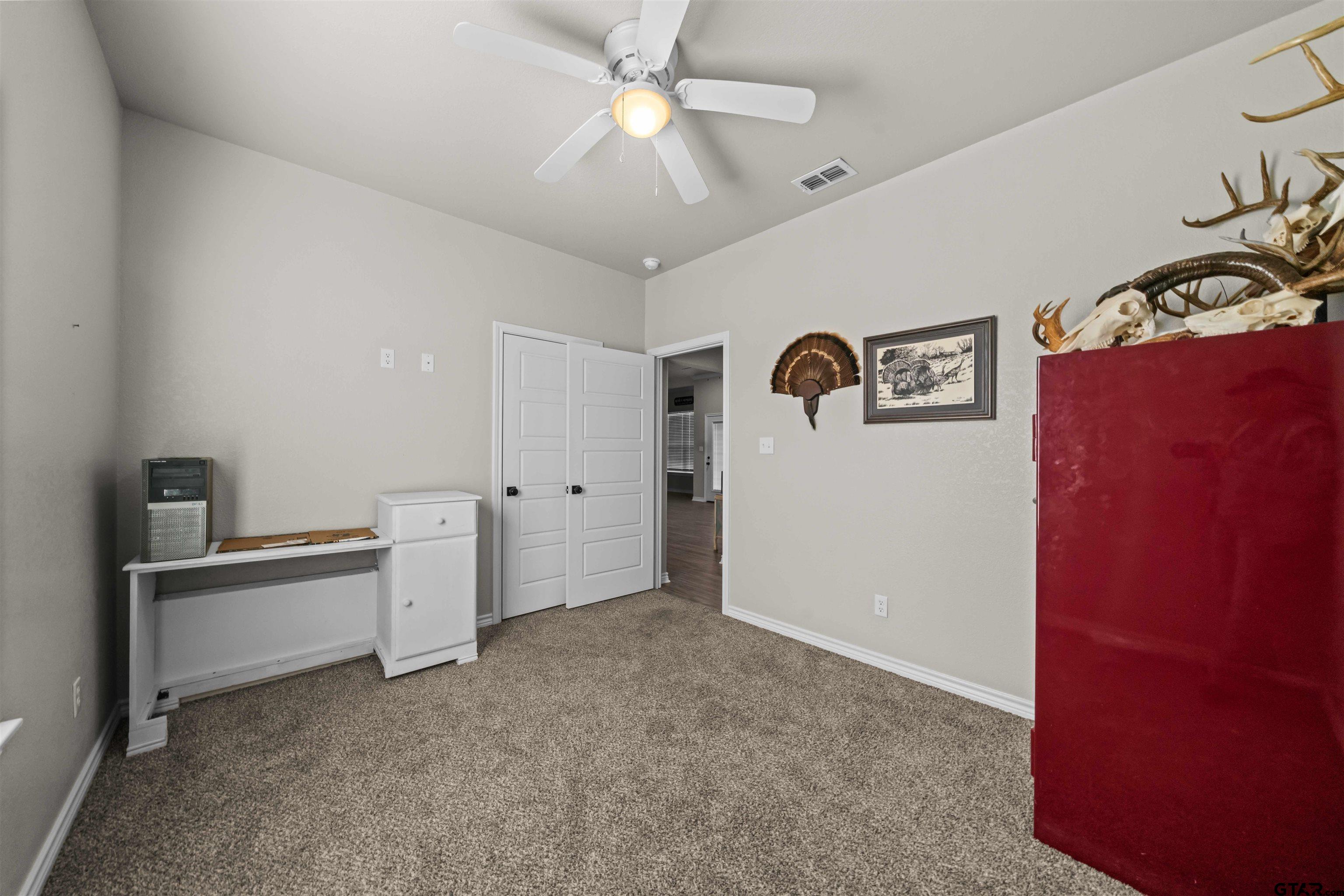 17023 County Road 2282 Troup, TX 75789 - Photo 23 of 30 a view of a workspace with furniture
