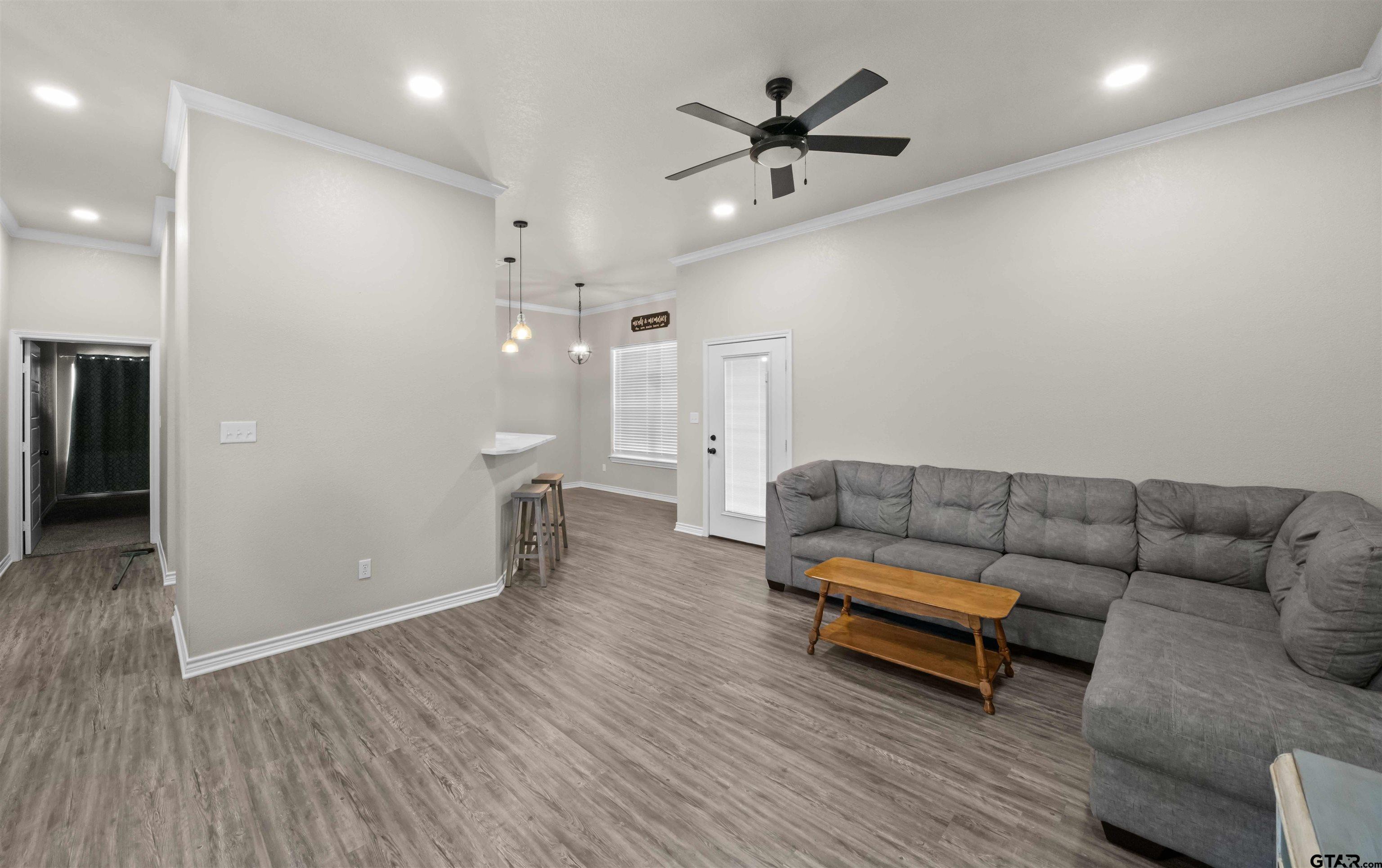 17023 County Road 2282 Troup, TX 75789 - Photo 5 of 30 a living room with furniture and wooden floor