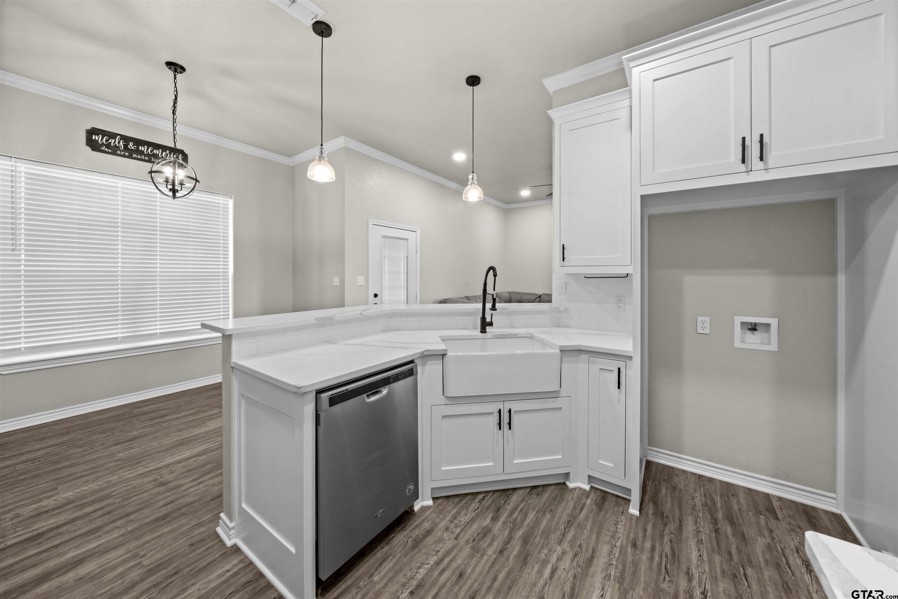 17023 County Road 2282 Troup, TX 75789 - Photo 10 of 30 a kitchen with a sink window and cabinets