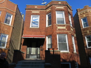 a front view of a multi story residential apartment building