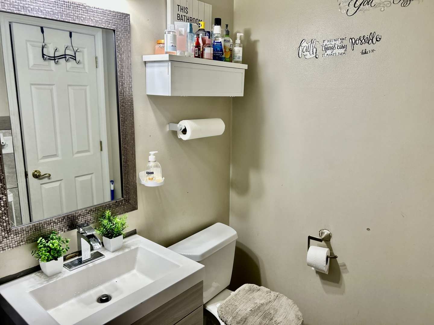 17308 Forestway Drive East Hazel Crest, IL 60429 - Photo 17 of 27 a bathroom with a sink and a mirror