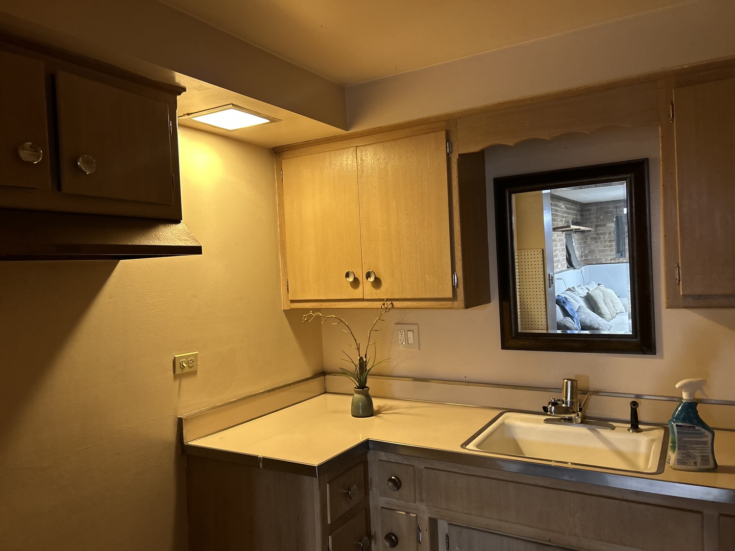 17308 Forestway Drive East Hazel Crest, IL 60429 - Photo 27 of 27 a bathroom with a sink and a mirror