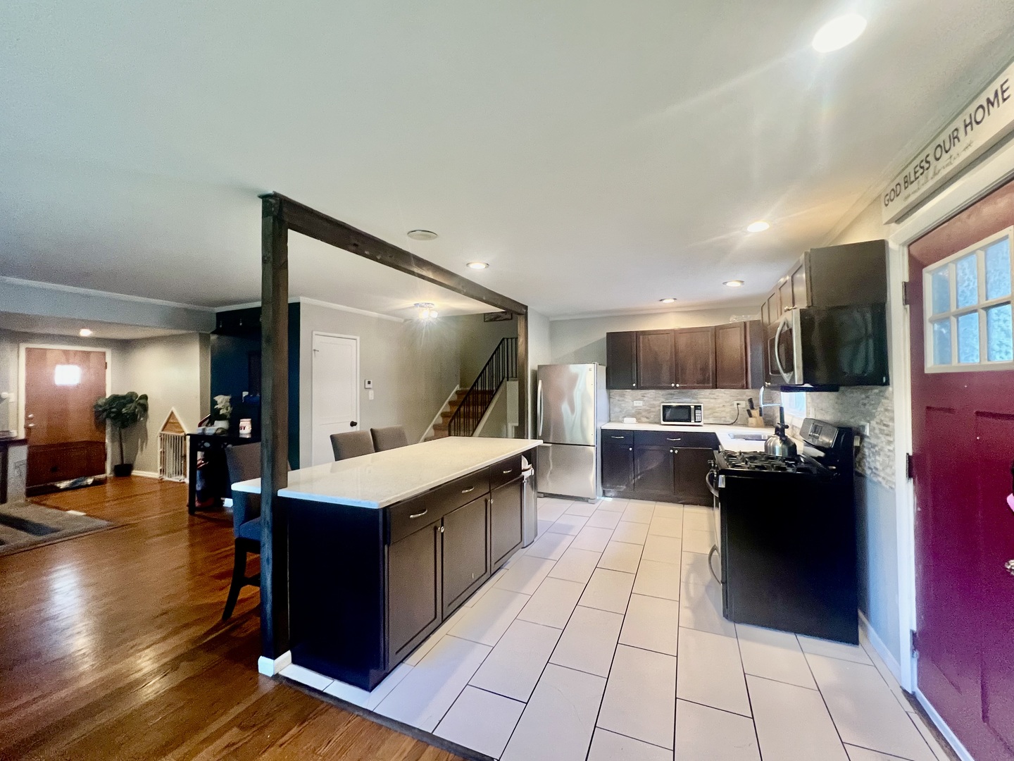 17308 Forestway Drive East Hazel Crest, IL 60429 - Photo 6 of 27 a large kitchen with stainless steel appliances kitchen island granite countertop a large counter top and cabinets