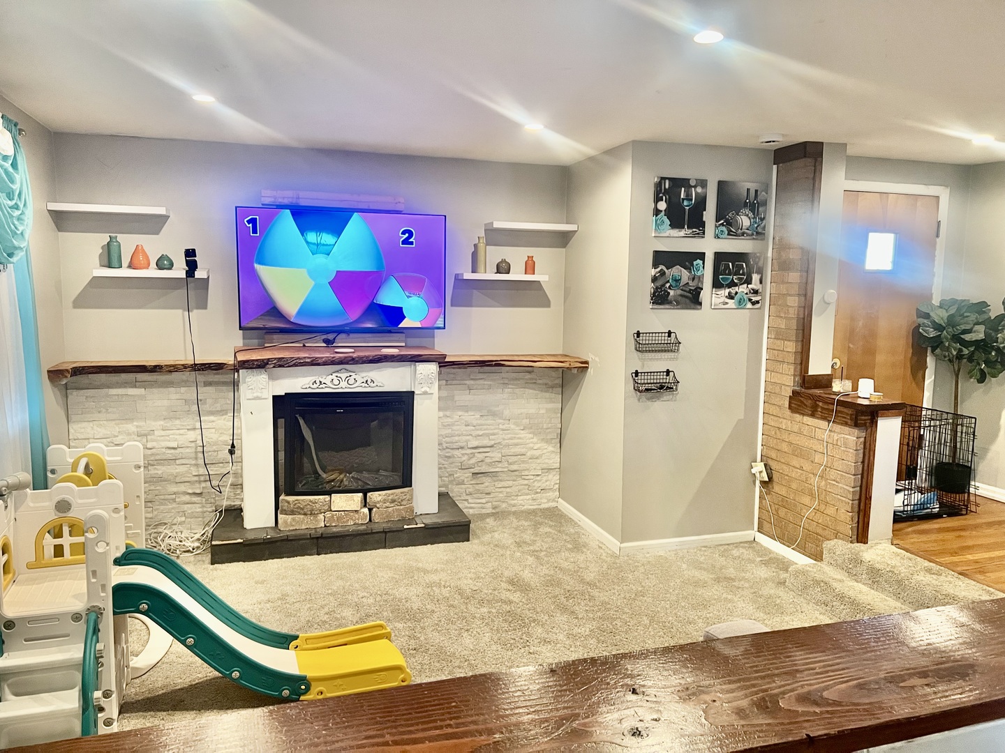 17308 Forestway Drive East Hazel Crest, IL 60429 - Photo 9 of 27 a living room with stainless steel appliances furniture and a flat screen tv