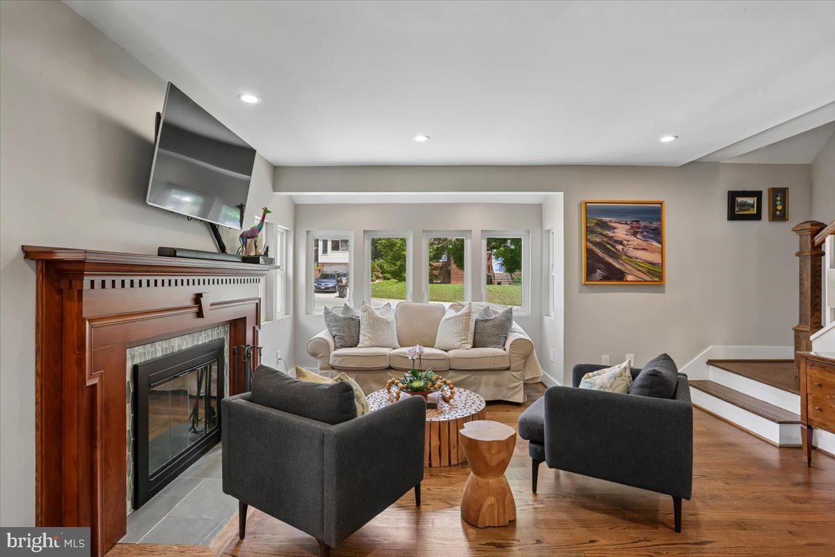 8812 2nd Avenue Silver Spring, MD 20910 - Photo 6 of 64 Light filled living room w/ fireplace