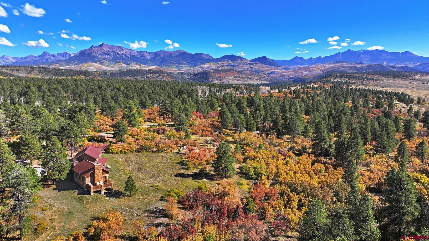 1250 McKenzie Springs Road Placerville, CO 81430 - Photo 2 of 45 a view of a city with sunset view