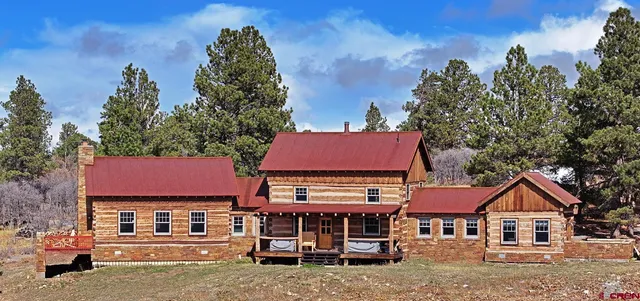 a view of a house with a window and wooden floor