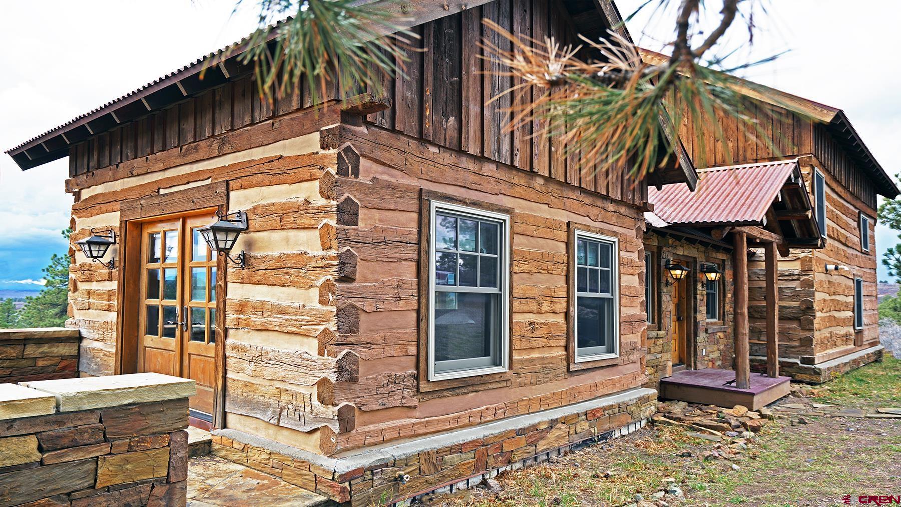 1250 McKenzie Springs Road Placerville, CO 81430 - Photo 29 of 45 a view of a house with a window and wooden floor
