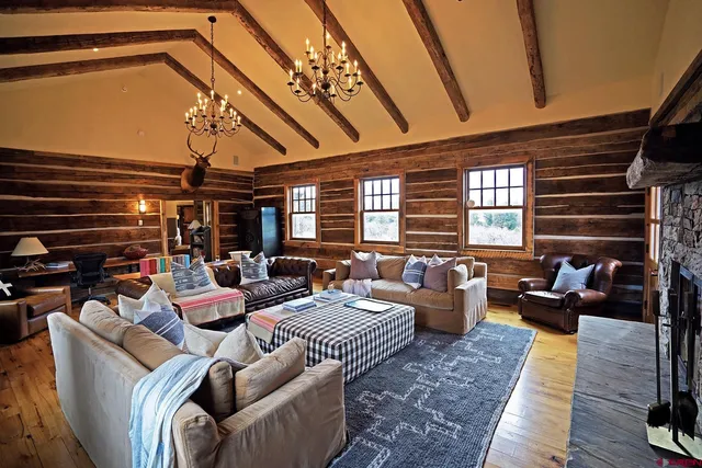 a kitchen with granite countertop stainless steel appliances and wooden cabinets
