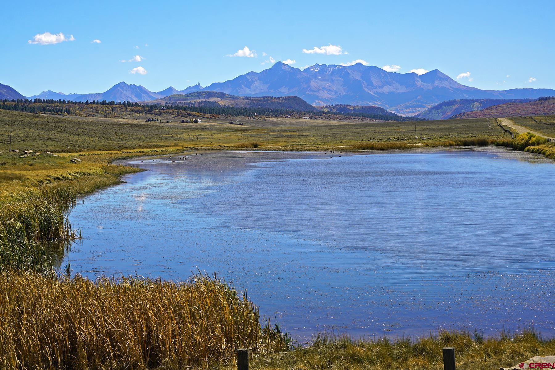 1250 McKenzie Springs Road Placerville, CO 81430 - Photo 44 of 45 a view of an ocean and a mountain