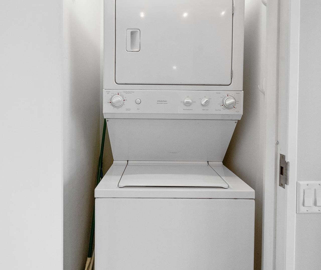 653 North Kingsbury Street, Unit 2004 Chicago, IL 60654 - Photo 12 of 15 a close up view of a washer and dryer
