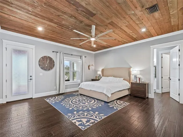 a spacious bathroom with a double vanity sink and a mirror