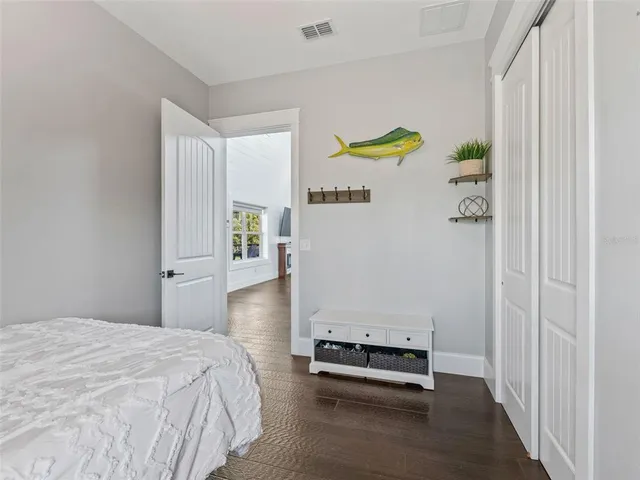a view of a livingroom with wooden floor
