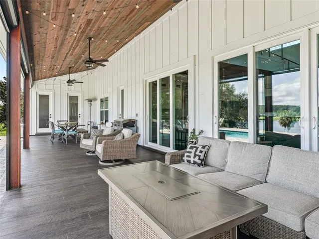 a front view of a house with a garden and porch