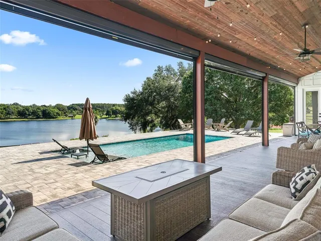 a house view with a sitting space and garden