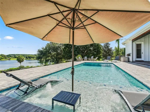 a view of a garden with a lake