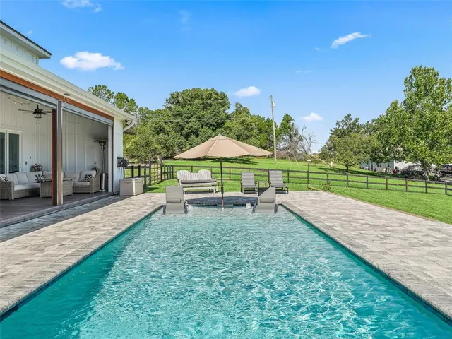 a view of a garden with an outdoor space