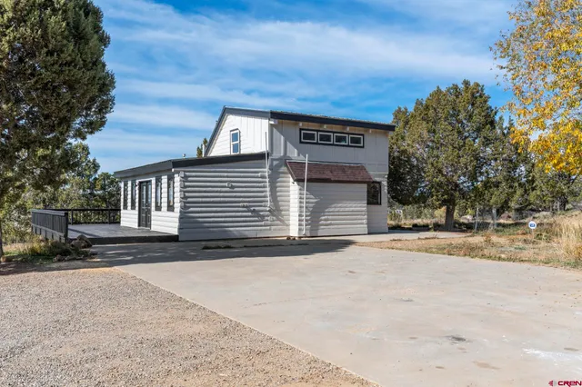 a view of balcony with wooden floor