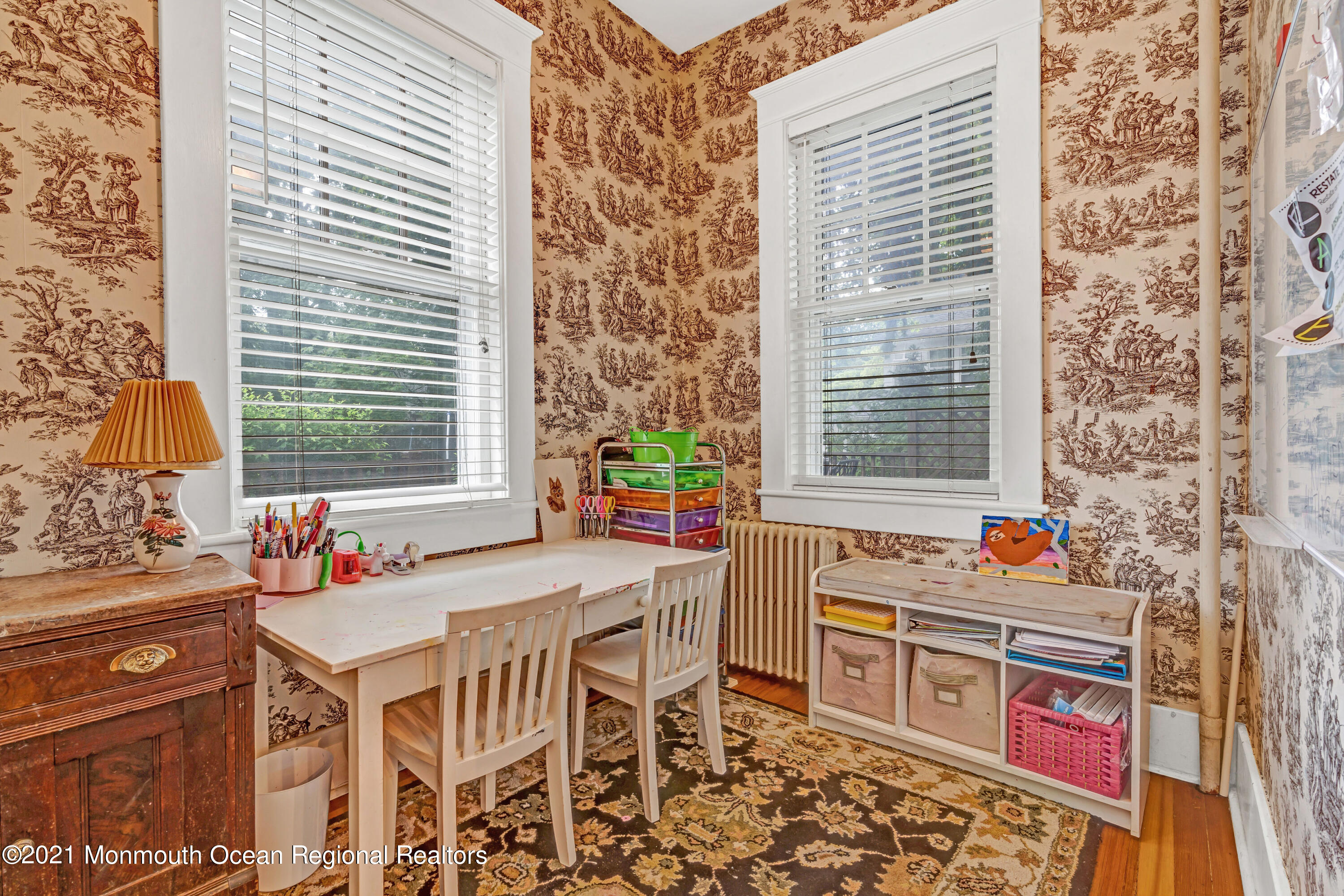 119 Pinckney Road Little Silver, NJ 07739 - Photo 14 of 40 a table and chairs in front of a door