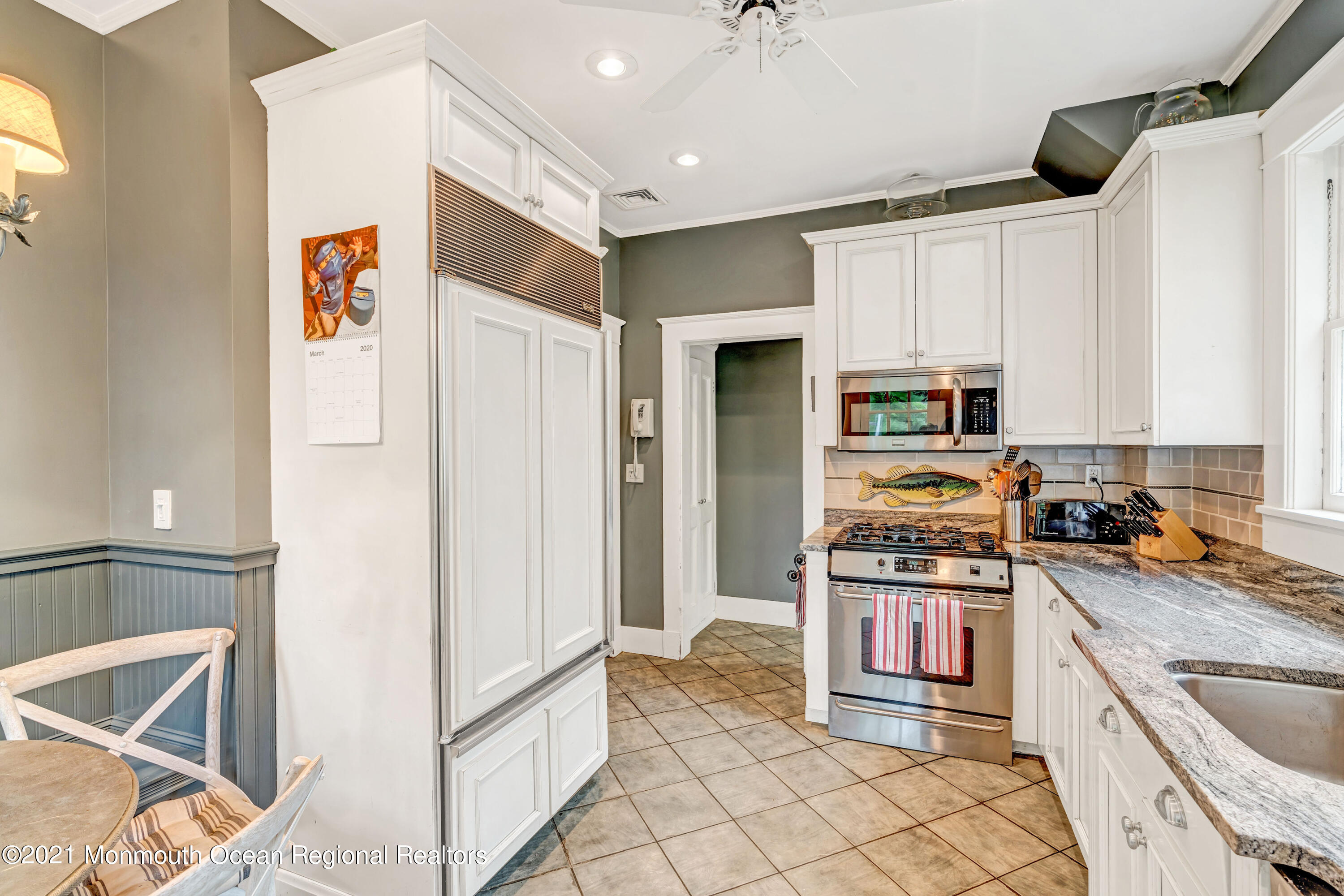 119 Pinckney Road Little Silver, NJ 07739 - Photo 21 of 40 a kitchen with stainless steel appliances granite countertop a refrigerator and a stove top oven